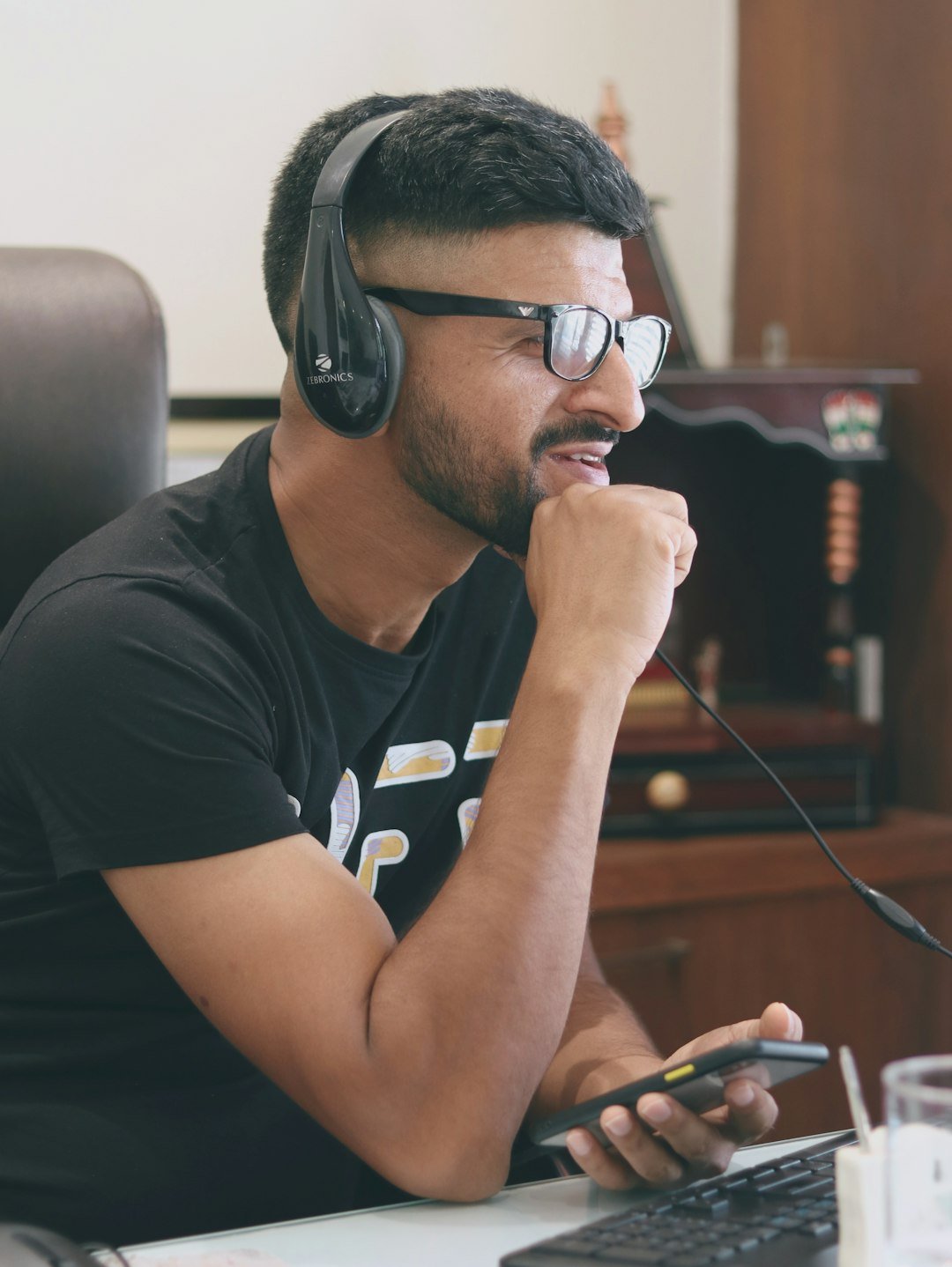 Indian small business owner working in office