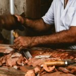 PM Vishwakarma Yojana: Loan & Toolkit for Artisans Indian artisan working with tools